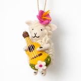 Handmade felt ornament of a sheep playing a Ukulele on a white background