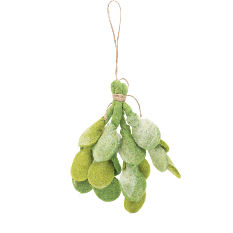 A Felt Mistletoe Sprig ornament is showcased against a stark white background. This unique felt ornament features tie-dye leaves in varying shades of green, adorned with a charming jute thread bow tie. A jute string loop extends from the top, perfect for hanging and adding a festive touch.